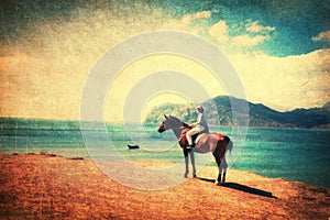 Riding horse on the beach