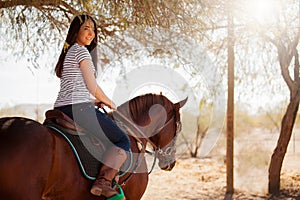 Riding a horse on a sunny day