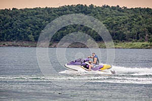 Riding a Jet ski.