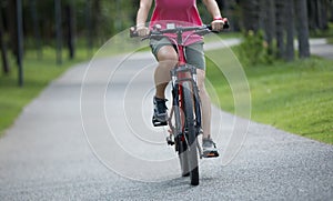 Riding mountain bike in tropical park