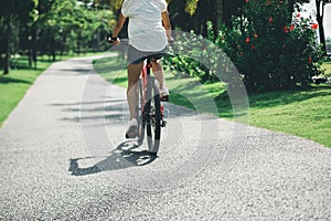 Riding mountain bike in tropical park