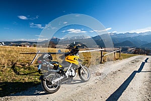 Riding mountains on motorbike photo