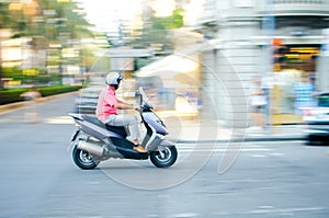 Riding a scooter