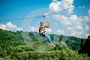 Riding on a zip line