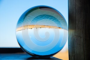 Rietvlei Dam through a solid glass ball.