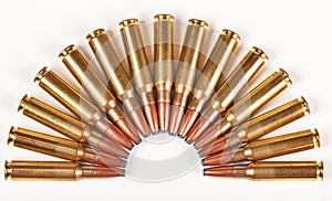 Rifle bullets packed in a half circle photo