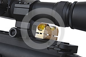 Rifle scope being checked for level