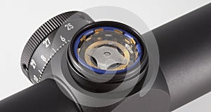 Rifle scope battery compartment