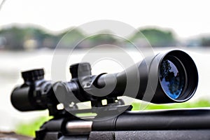 Rifle with a scope and bipod photo