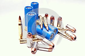 Rifled slug shotgun shells with 223 caliber bullets along with 45 caliber and 9mm hollow point bullets