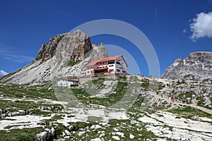 The Rifugio Locatelli and the Tre Cime di Lavaredo Three Peaks . Dolomites, Italy.