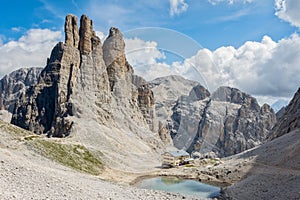 Rifugio Re Alberto and the Vajolet Towers Torri Vajolet, Dolomites, Italy on a beautiful summer day