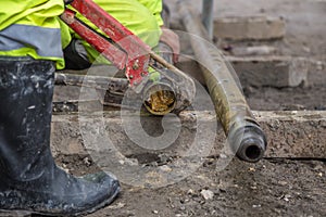 Rig workers at site take out drill core sample