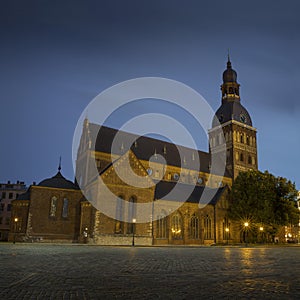 Riga Cathedral at Cathedral Square during evening blue hour, Doma laukums, Riga, Latvia. Aerial panoramic view photo