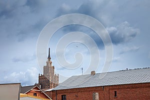 Riga with a focus on the building of the latvian academy of sciences, or latvijas zinatnu akademija. It\'s a vintage photo