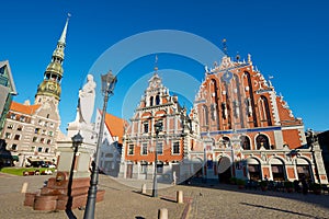 City Hall square with House of the Blackheads, Roland statue and Saint Peter church in the old town in Riga, Latvia.