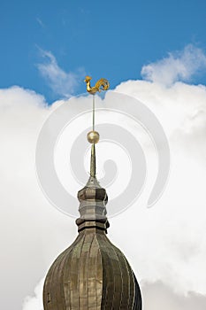 Doma Church golden spire with a golden rooster photo