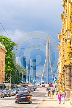 RIGA, LATVIA, AUGUST 15, 2016: View of a street leading to the Vansu tilts bridge over Daugava river in Riga, Latvia