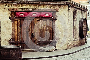 Riga, Latvia. Door of medieval restaurant Rozengrals, Vinarium Civitatis Rigensis, in the old town of Riga.
