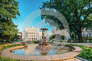 Riga, Latvia. Fountain Nymph In Water Splashes Aspazijas Boulevard Near National Opera House.