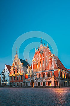 Riga, Latvia. Schwabe House And House Of The Blackheads At Town Hall Square, Ancient Historical Landmark And Popular photo