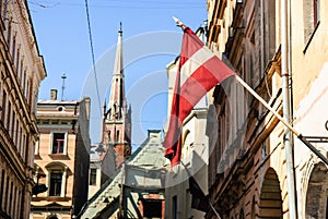 Riga old town with Latvian flag, Riga, Latvia