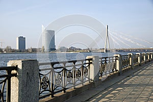 Riga. Quay of the river Dvina and a kind on the bridge.