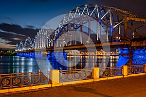 Riga railway bridge illuminated at night