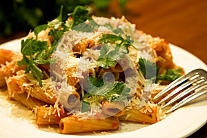 Rigatoni pasta with parsley photo