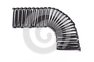 A right angle of frame laid out by black avarage screws on white background