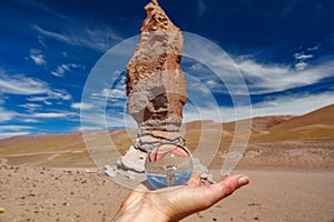 Right hand holding crystal ball near Pacana Monks photo