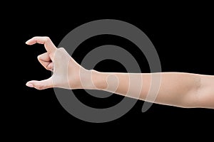 Right hand of a woman trying to reach or grab something. fling, touch sign. Reaching out to the left, show C sign. isolated on