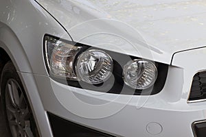 The right headlight of a car
