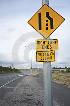 Right Lane Ends sign along 48th street in Yellowknife, Canada