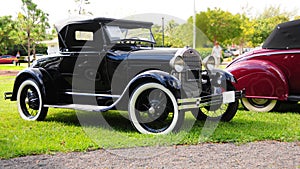 Right side view of black 1928 Ford horseless carriage