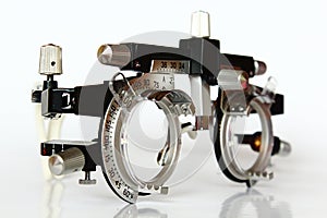 Right side view of trial frame used in ophtalmology and optometry to diagnose and correct refractive errors.