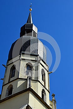 Right, southern gothic church tower of Cathedral of Saint Nicholas on Square Of Saint Nicholas in Trnava, Slovakia