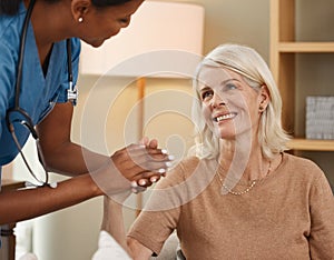 The right support on the road to recovery. a doctor having a consultation with a senior woman at home.