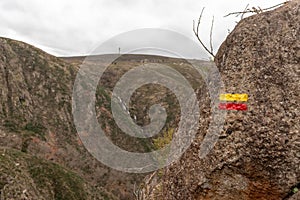 Right way symbol painted on rock , walking route in Arouca , Portugal