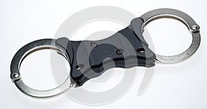 Rigid bar handcuffs photo