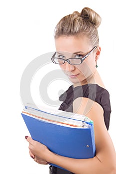 Rigorous woman in glasses with papers
