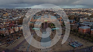 Rijksmuseum Amsterdam in The Netherlands aerial drone view timelapse hyperlapse of a sunny winter day.