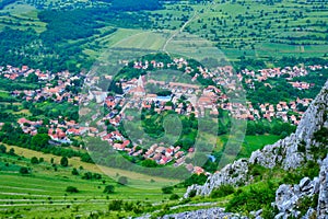 Rimetea village seen from a rock climbing route, part of Rimetea Climbing Open RICO, in Trascau Mountains, Romania.