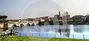 Rimini cityscape view. Tiberius bridge photo