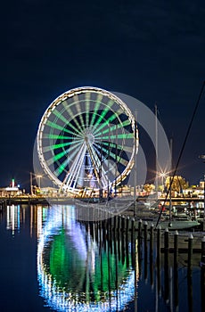 RIMINI night view of ferris wheel from dock