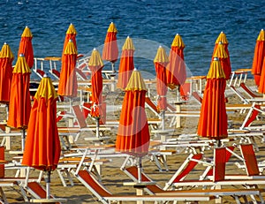 Rimini - Orange umbrellas and sunbeds