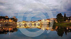 Rimini twilight on view of tiberius bridge. Sunset photo