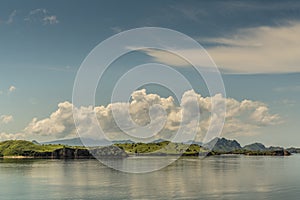 Flat islets off Rinca Island westside coast, Indonesia photo