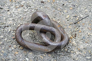 Ring and anchor chain on shore to tie up ship
