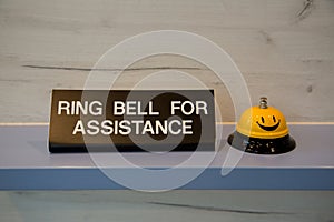 Ring bell for assistance sign